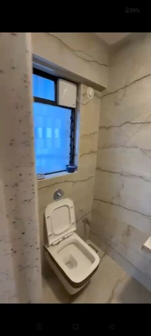 Bathroom in 2 BHK Apartment at Svarna Rosemary, Mahim West – for Rent