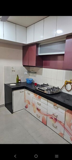Kitchen in 2 BHK Apartment at Godrej Garden City Carmel, Jagatpur – for Rent