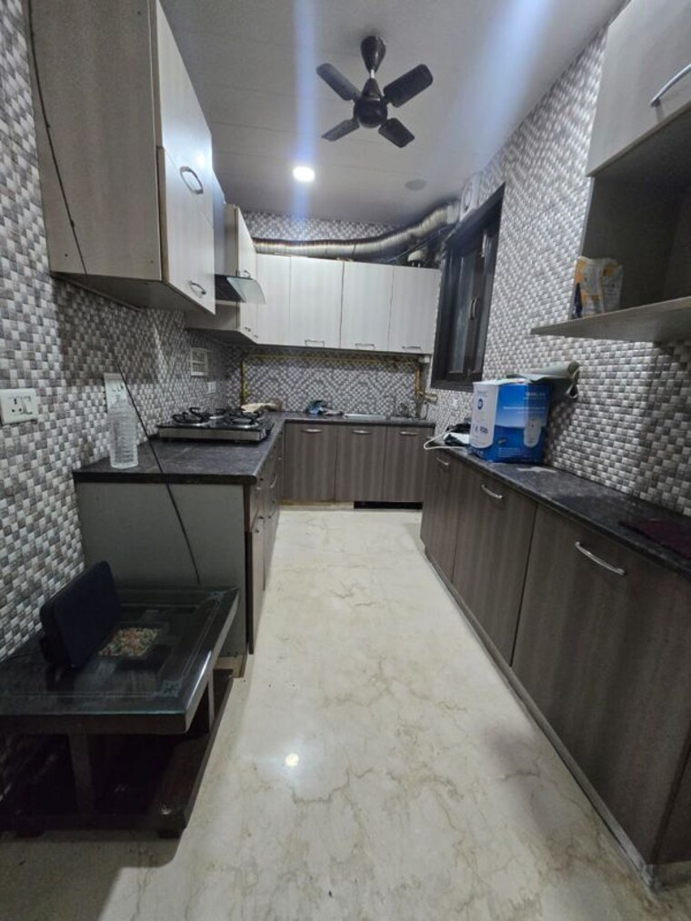 Kitchen, amar colony 2 Bedroom 1000 Sq.Ft. Builder Floor In Amar Colony Delhi 10505161