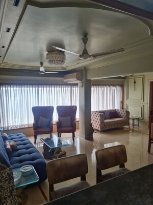 Living Room in 3 BHK Apartment at Transcon Flora Heights, Andheri West – for Rent
