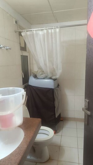 Bathroom in 2 BHK Apartment at Mahindra Aura Phase III, Sector 110a – for Sale