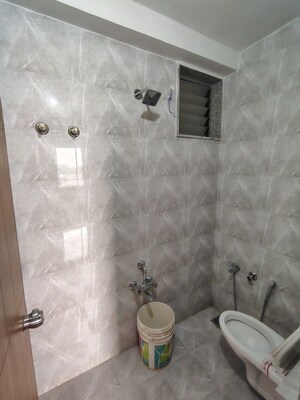 Bathroom in 2 BHK Apartment at Chetak Radhe Madhav, Sanand – for Rent