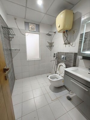 Bathroom in 3 BHK Apartment at Orchid Island, Sector 51 – for Rent