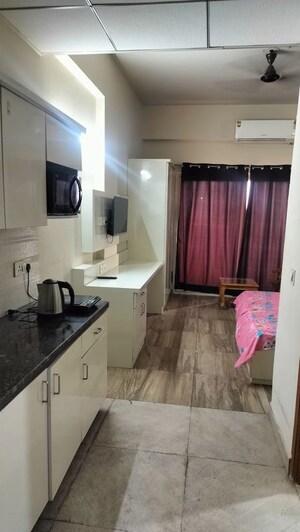 Team Area in 1 RK Apartment at Paramount Golf Forest Studio Apartments - OAK Towe, Zeta I Greater Noida – for Rent