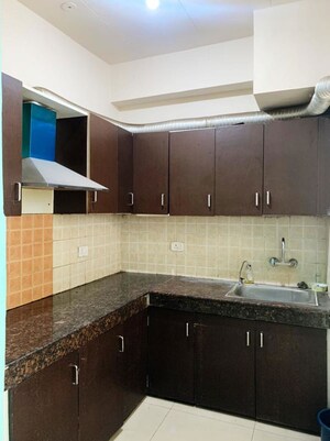Kitchen in 2 BHK Apartment at Ajnara Integrity, Raj Nagar Extension – for Sale