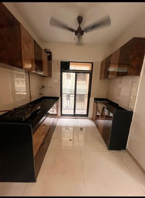 Kitchen in 2 BHK Apartment at Kalpana CHS Naupada, Naupada – for Rent