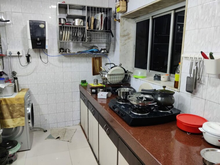 Kitchen, dn nagar 2 Bedroom 800 Sq.Ft. Apartment In Dn Nagar Mumbai 10444194