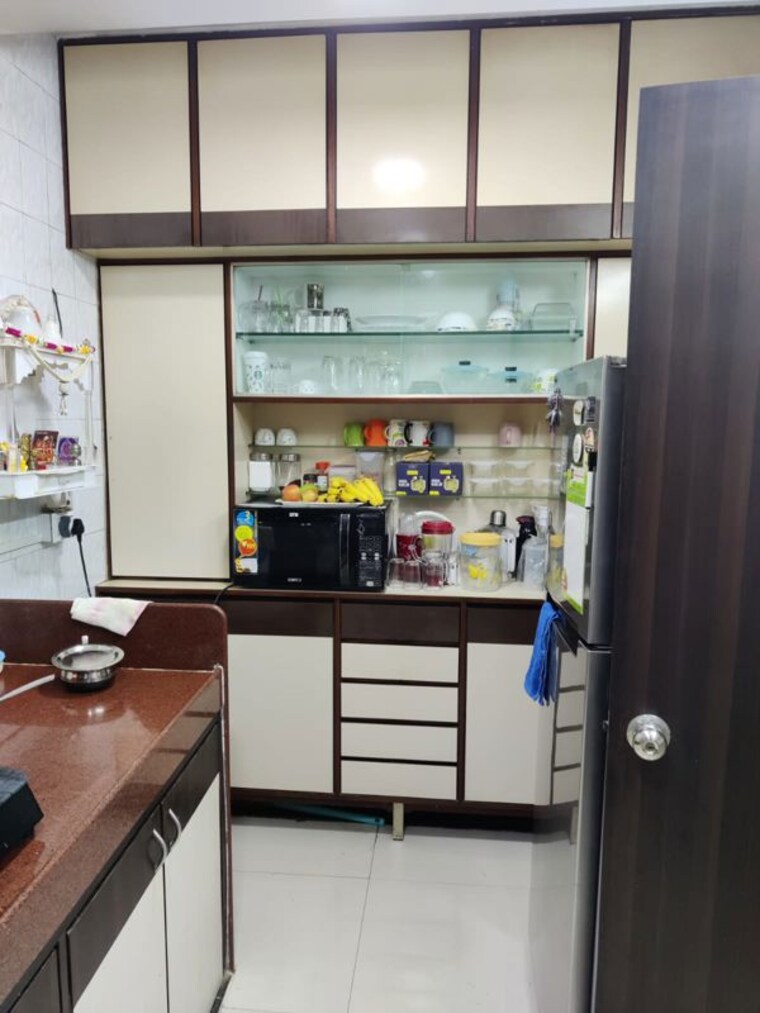 Kitchen, dn nagar 2 Bedroom 800 Sq.Ft. Apartment In Dn Nagar Mumbai 10444194