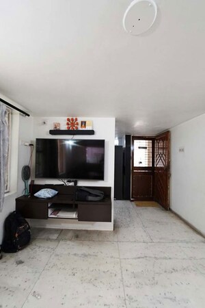Living Room in 4 BHK Apartment at Ellis Bridge – for Sale