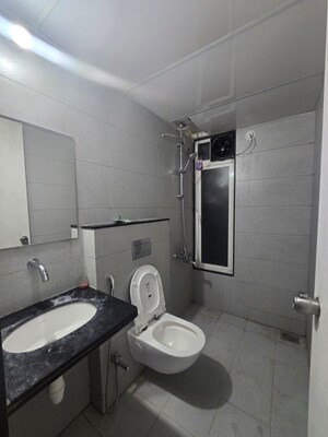 Bathroom in 2 BHK Apartment at Rama Livmo, Hinjewadi – for Rent