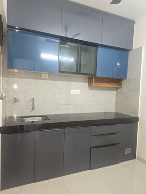 Kitchen in 2 BHK Apartment at Rama Livmo, Hinjewadi – for Rent
