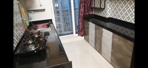 Kitchen in 1 BHK Apartment at Shree Tirupati STG Signature Residency, Patlipada – for Rent