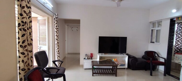 Living Room, pandit-javdekar-red-earth 2 Bedroom 1200 Sq.Ft. Penthouse In Pirangut Pune 10505707