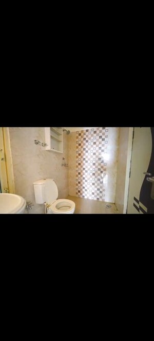 Bathroom in 2 BHK Apartment at Uninav Heights Phase I, Raj Nagar Extension – for Sale
