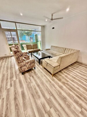 Living Room in 4 BHK Apartment at Jor Bagh – for Rent