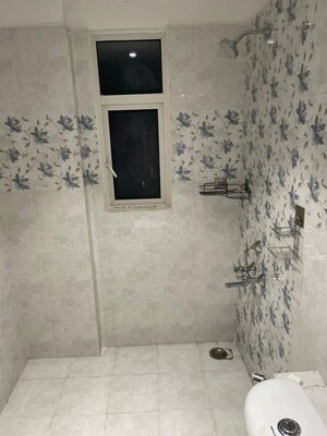 Bathroom in 3 BHK Apartment at Unique Sapphire, Mohanpura – for Rent