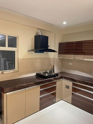 Kitchen in 3 BHK Apartment at Unique Sapphire, Mohanpura – for Rent
