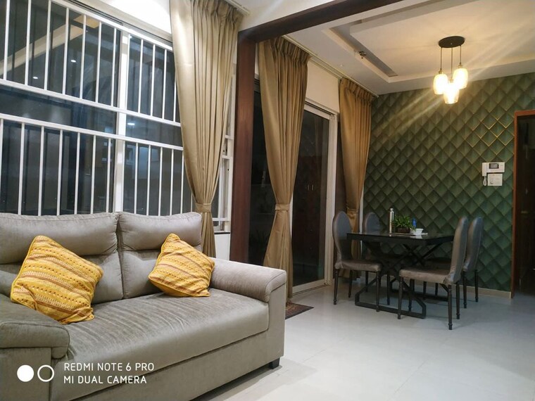Living Room, kolte-patil-life-republic-sec-r7-7th-avenue-i 2 Bedroom 885 Sq.Ft. Apartment In Hinjewadi Pune 10505898