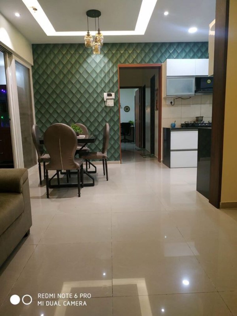 Living Room, kolte-patil-life-republic-sec-r7-7th-avenue-i 2 Bedroom 885 Sq.Ft. Apartment In Hinjewadi Pune 10505898
