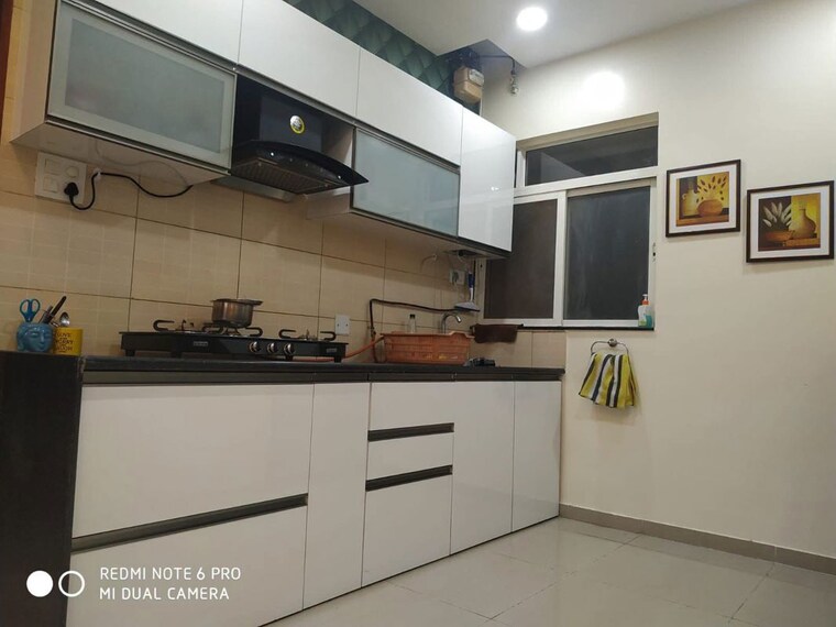 Kitchen, kolte-patil-life-republic-sec-r7-7th-avenue-i 2 Bedroom 885 Sq.Ft. Apartment In Hinjewadi Pune 10505898