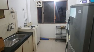 Kitchen in 2 BHK Apartment at Fortaleza CHSL, Kalyani Nagar – for Rent