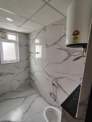 Bathroom in 3 BHK Apartment at Rishita Manhattan, Gomti Nagar – for Rent