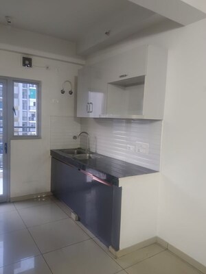 Kitchen in 3 BHK Apartment at Gulshan Bellina, Sector 16 Greater Noida – for Rent