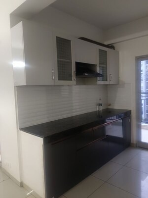 Kitchen in 3 BHK Apartment at Gulshan Bellina, Sector 16 Greater Noida – for Rent