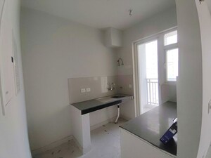 Kitchen in 2 BHK Apartment at Eldeco Live By The Greens, Sector 150 – for Sale