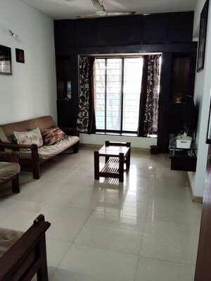 Living Room in 3 BHK Apartment at Kusum Kunj, Prabhat Road – for Sale