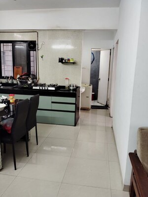 Kitchen in 3 BHK Apartment at Kusum Kunj, Prabhat Road – for Sale