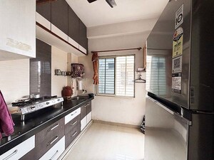 Kitchen in 1 BHK Apartment at Sola – for Sale