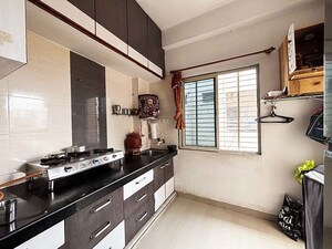 Kitchen in 1 BHK Apartment at Sola – for Sale