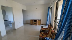 Living Room in 2 BHK Apartment at Shapoorji Pallonji Joyville Hinjewadi, Hinjewadi – for Rent