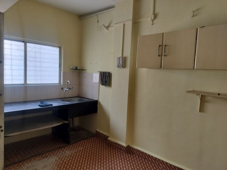 Kitchen, laxmi-tara-market 1 Bedroom 500 Sq.Ft. Apartment In Thergaon Pune 10506196