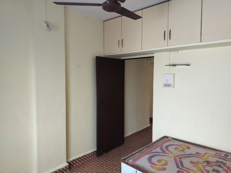 Bedroom, laxmi-tara-market 1 Bedroom 500 Sq.Ft. Apartment In Thergaon Pune 10506196