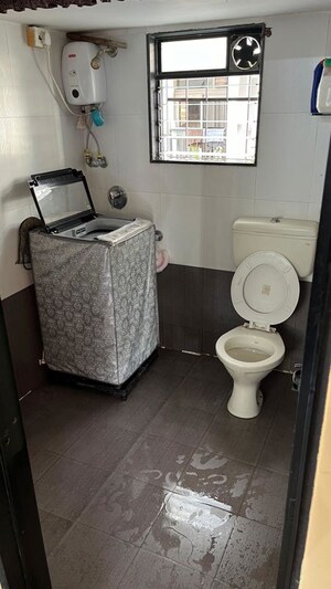Bathroom in 1 BHK Apartment at Daulat Nagar – for Sale
