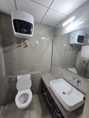 Bathroom in 2 BHK Apartment at Eldeco Live By The Greens, Sector 150 – for Rent