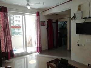 Living Room in 2 BHK Apartment at Mahaluxmi Green Mansion, Zeta I Greater Noida – for Sale