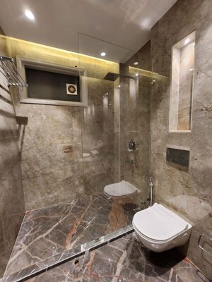 Bathroom in 3 BHK Builder Floor at Freedom Fighters Enclave – for Rent