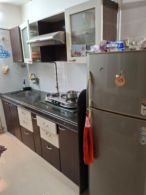 Kitchen in 2 BHK Apartment at Westin Karmayog CHS, Andheri West – for Rent
