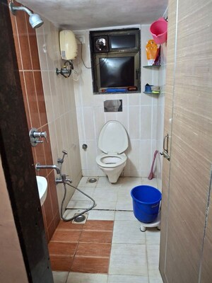 Bathroom in 2 BHK Apartment at Westin Karmayog CHS, Andheri West – for Rent
