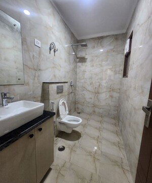 Bathroom in 2 BHK Builder Floor at Freedom Fighters Enclave – for Sale