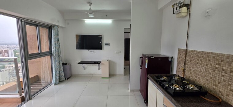 Kitchen, amanora-adreno-towers 1 Bedroom 800 Sq.Ft. Apartment In Hadapsar Pune 10506580