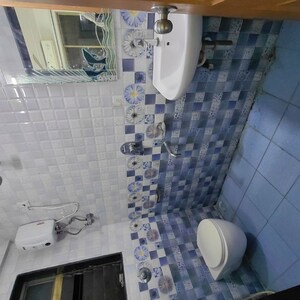Attached Bathroom in 2 BHK Apartment at Sadguru Complex II, Goregaon West – for Sale