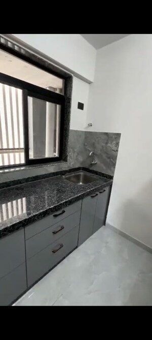 Kitchen in 2 BHK Apartment at Deraiya Classico, Kurla East – for Rent