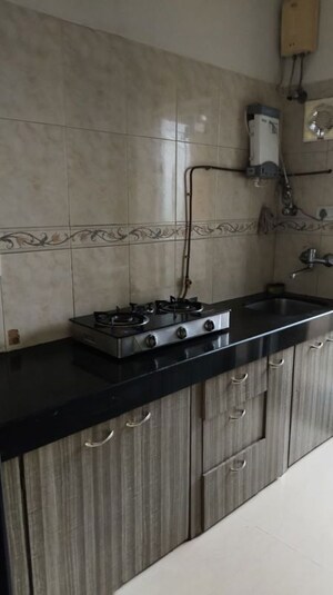 Kitchen in 1 BHK Apartment at K Raheja Heights, Malad East – for Rent