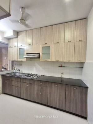Kitchen in 3 BHK Apartment at RNA NG Suncity Phase II, Kandivali East – for Rent