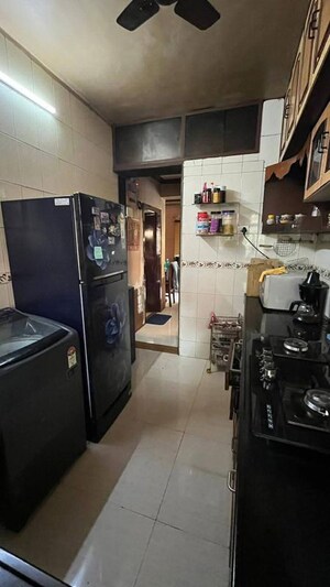 Kitchen in 2 BHK Apartment at Pearl CHS, Dadar East – for Rent