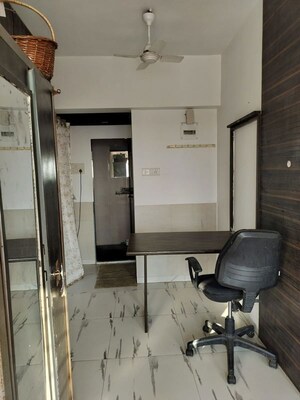 Team Area in Studio Apartment at Royal Palms Garden View, Goregaon East – for Rent